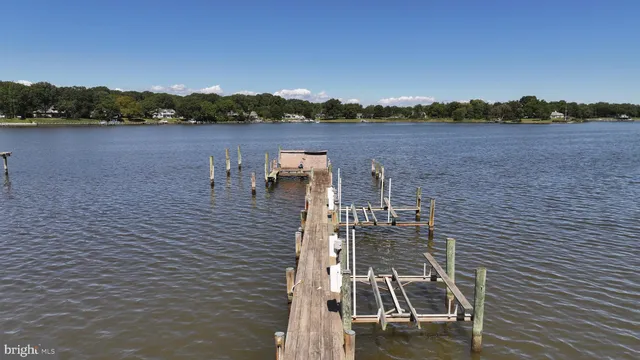 a kitchen with stainless steel appliances a refrigerator and cabinets