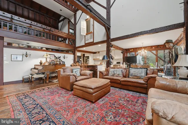 a living room with large windows