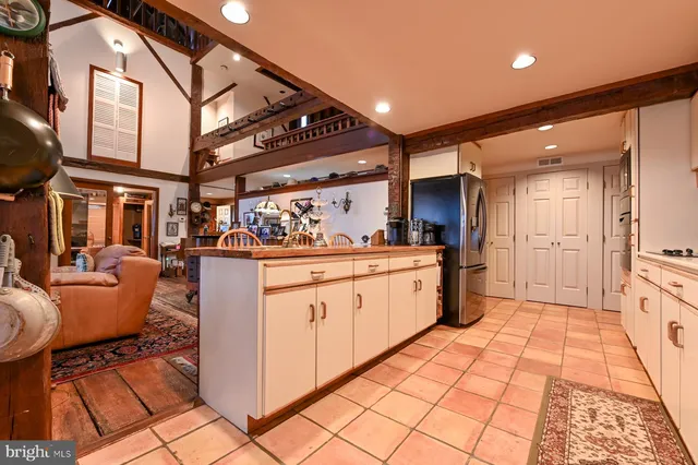 a bathroom with a toilet a sink and a shower