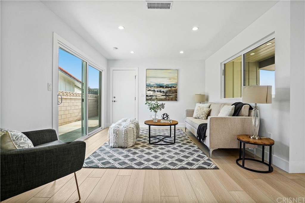3675 Denair Street Pasadena, CA 91107 - Photo 13 of 37 a living room with furniture and a window
