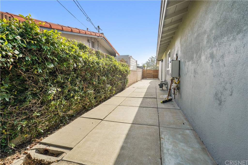 3675 Denair Street Pasadena, CA 91107 - Photo 36 of 37 a view of a pathway both side of house