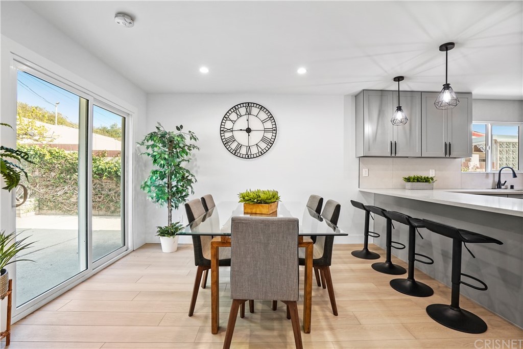 3675 Denair Street Pasadena, CA 91107 - Photo 7 of 37 a view of a dining room with furniture window and wooden floor