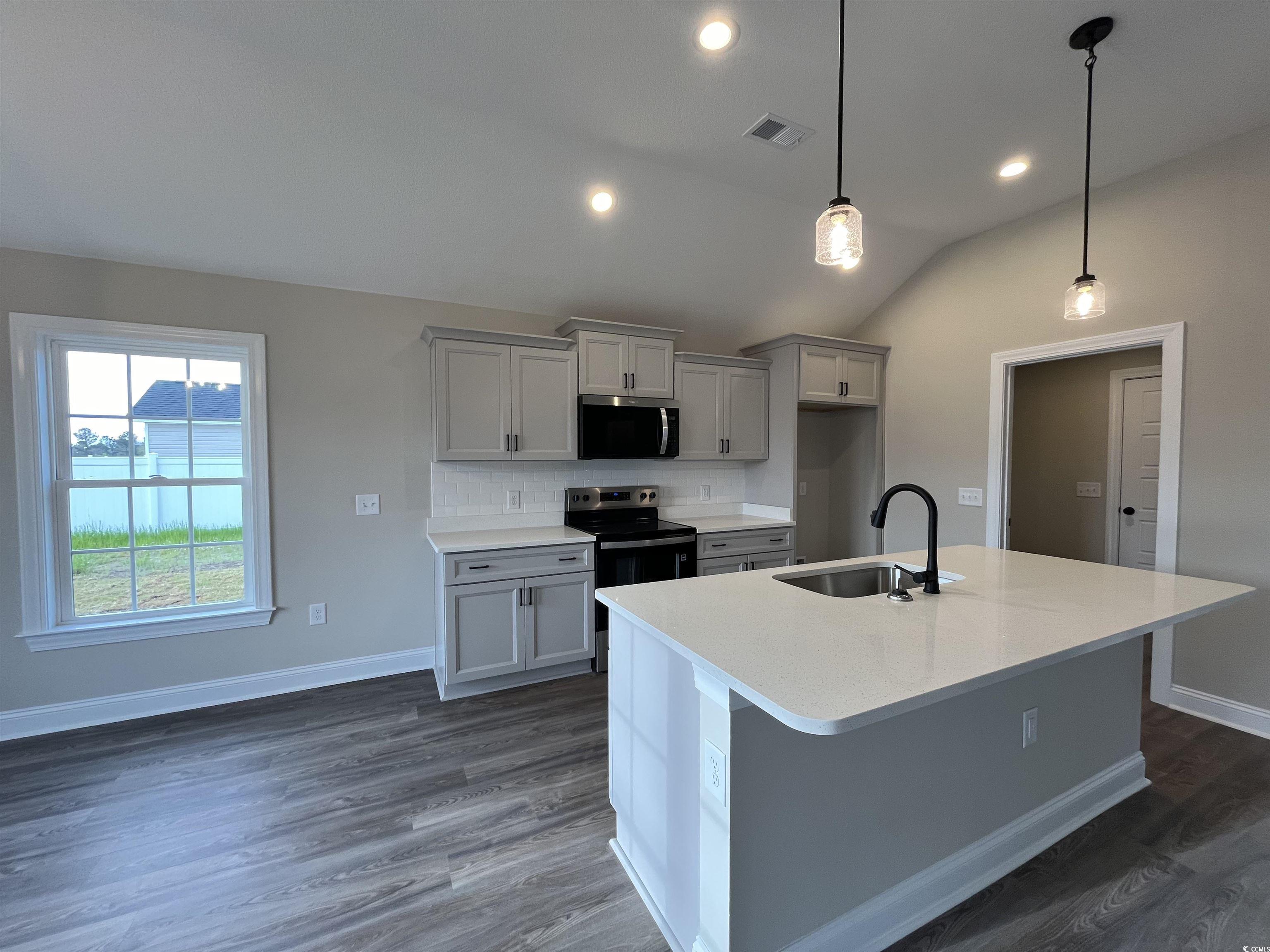 487 Highway 348 Loris, SC 29569 - Photo 9 of 17 Kitchen featuring visible vents, black range with