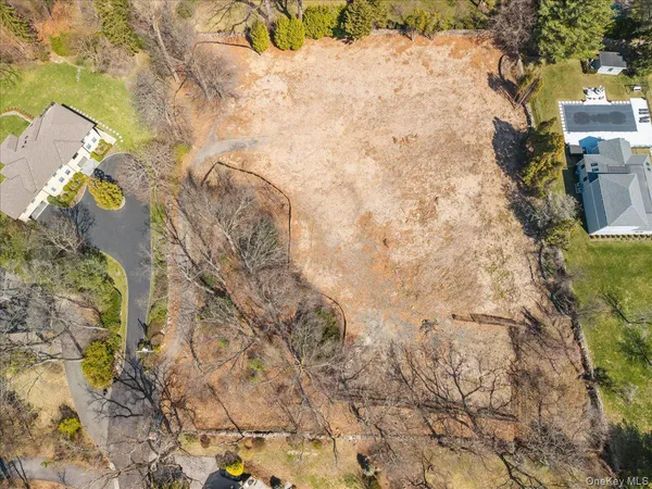 a aerial view of a house with a yard