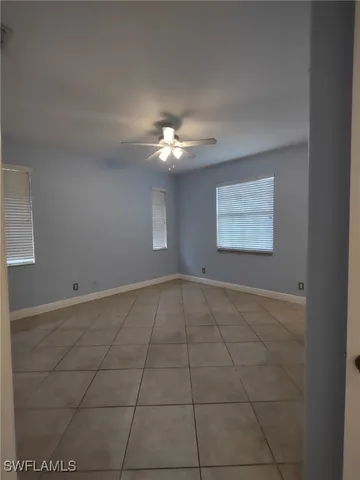 a bathroom with a glass door shower