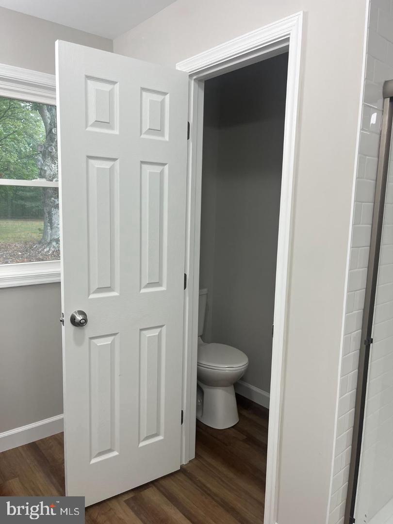 28542 Raccoon Ford Road Culpeper, VA 22701 - Photo 16 of 31 Bright and airy bathroom with private toilet.