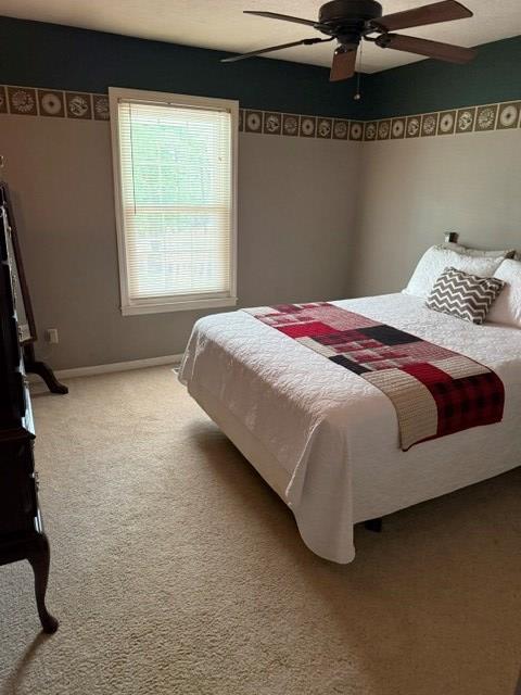 2948 Hendriske Road Young Harris, GA 30582 - Photo 11 of 20 a bedroom with a bed and window