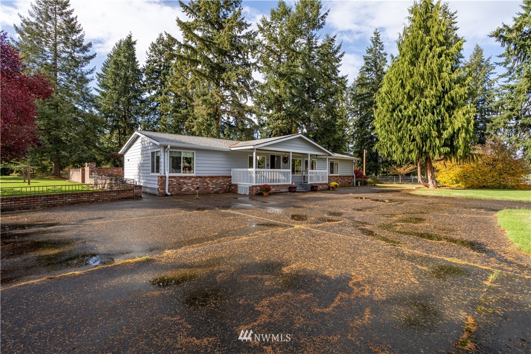 18703 Joselyn Road Southwest Rochester, WA 98579 - Photo 2 of 40 a house view with a outdoor space