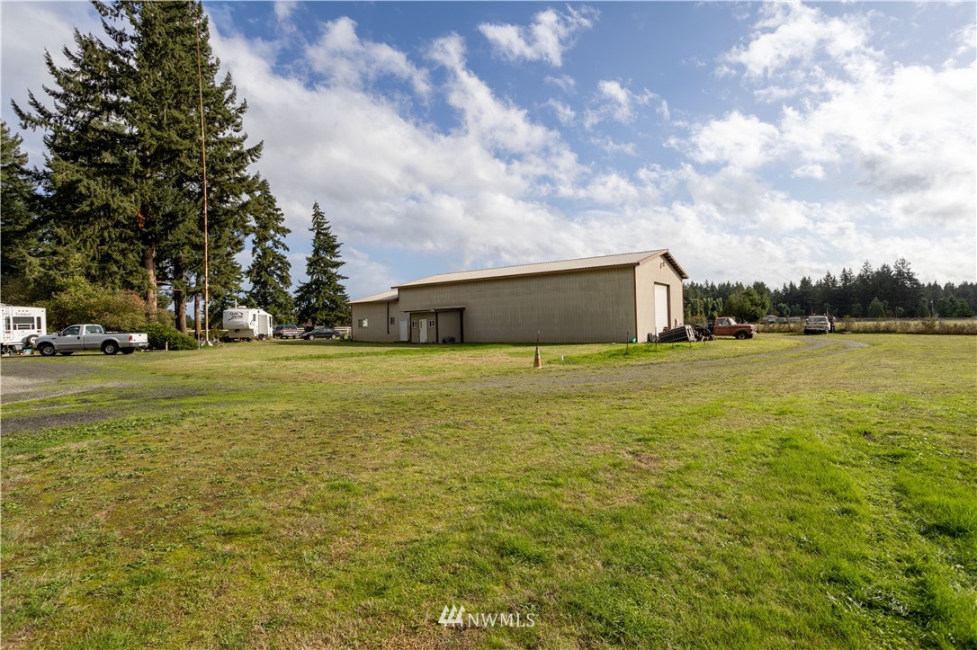 18703 Joselyn Road Southwest Rochester, WA 98579 - Photo 21 of 40 a view of a field with an trees