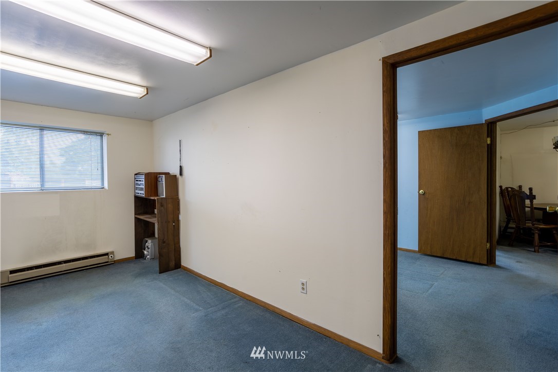 18703 Joselyn Road Southwest Rochester, WA 98579 - Photo 27 of 40 a view of room with hardwood floor and closet