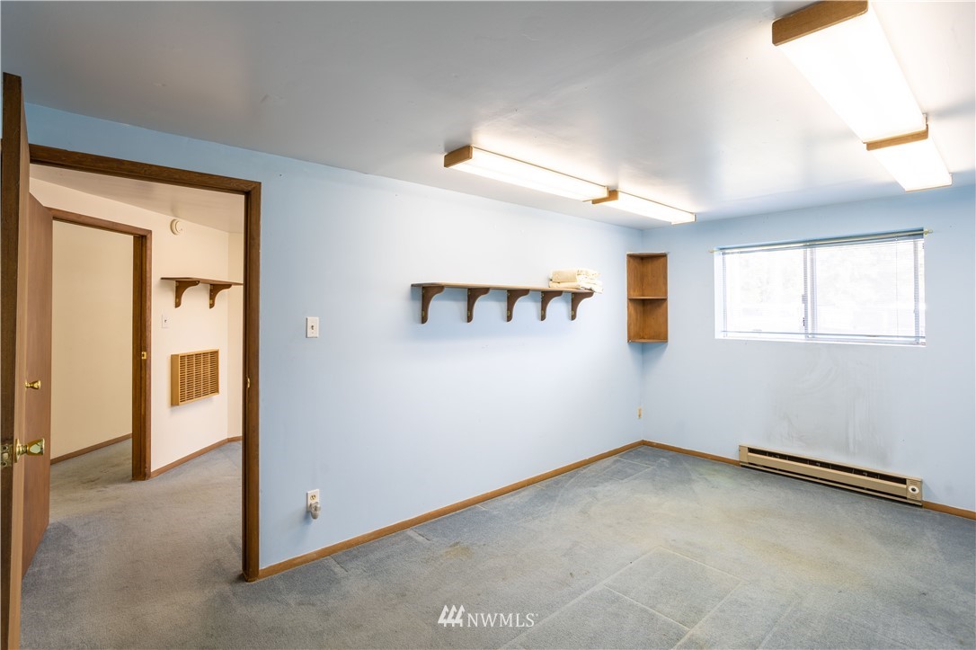 18703 Joselyn Road Southwest Rochester, WA 98579 - Photo 31 of 40 an empty room with windows