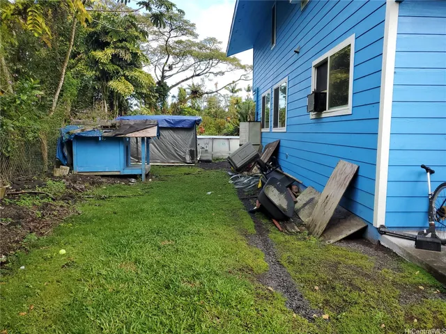a house view with a garden space