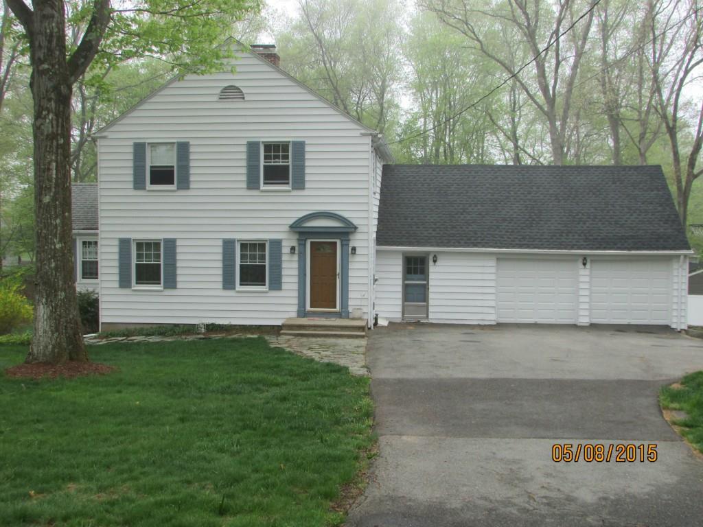 846 Hillcrest Road Orange, CT 06477 - Photo 1 of 1 front view of a house with a yard
