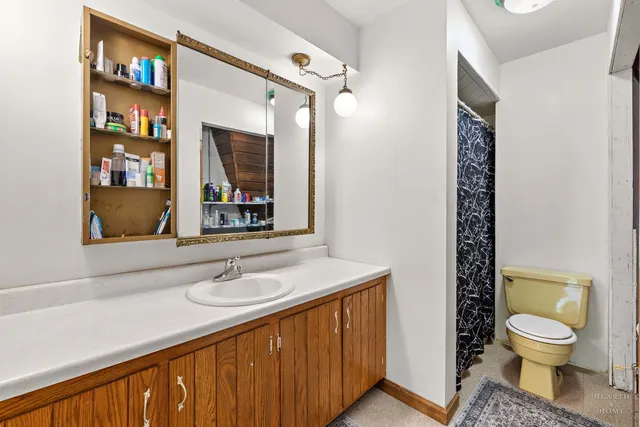 a view of a chairs and table in a patio