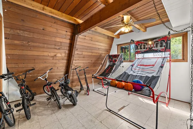 a picture of a room with a floor and a refrigerator