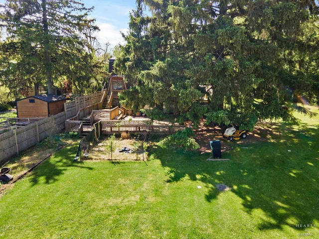 a view of a golf course with chairs