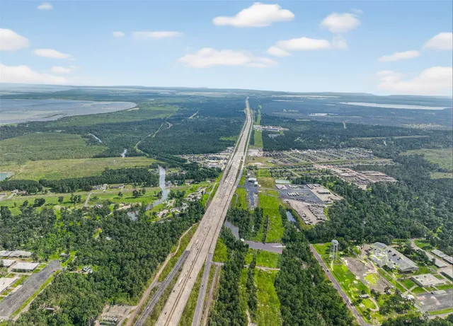 a view of a yard with an outdoor seating