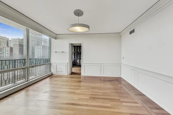 a view of an empty room with a window