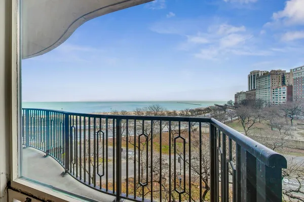 a balcony with a city view