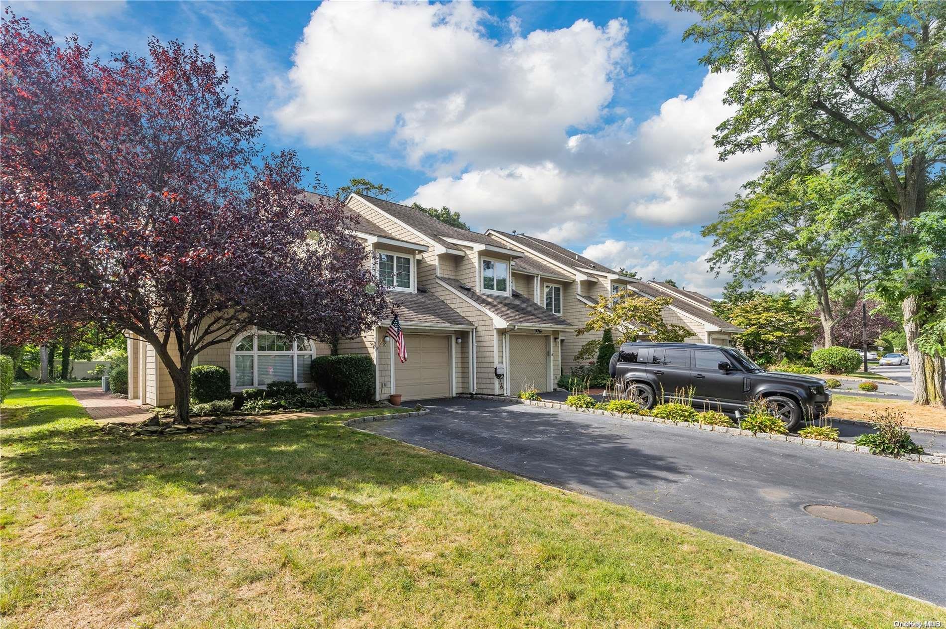 20 Cedar Ridge Lane, Unit 20 Bay Shore, NY 11706 - Photo 1 of 1 Double Driveway