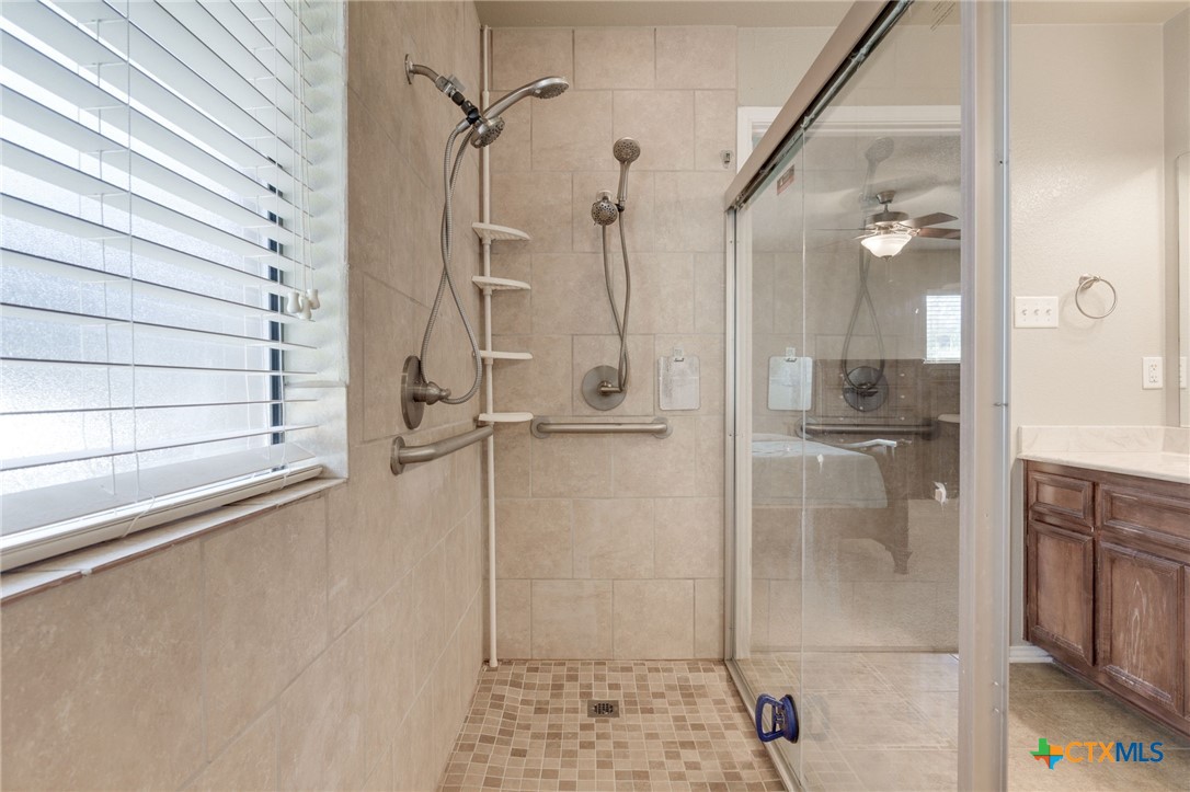 1467 County Road 4820 Kempner, TX 76539 - Photo 20 of 38 a bathroom with a shower