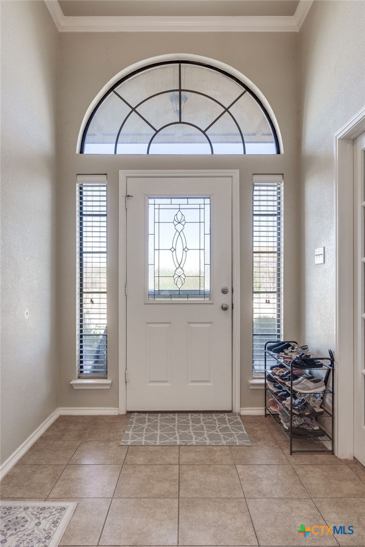 1467 County Road 4820 Kempner, TX 76539 - Photo 5 of 38 a view of a livingroom with entryway and dining room
