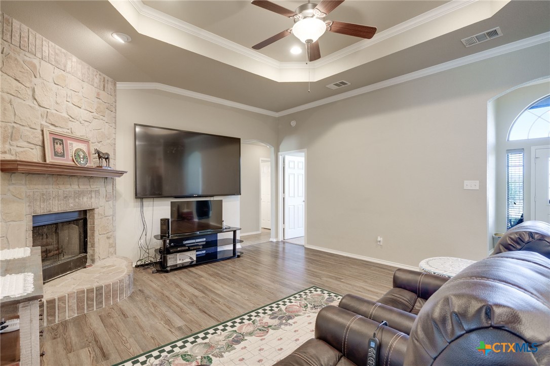 1467 County Road 4820 Kempner, TX 76539 - Photo 6 of 38 a living room with furniture and a flat screen tv