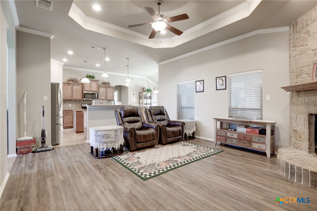1467 County Road 4820 Kempner, TX 76539 - Photo 8 of 38 a living room with furniture and a wooden floor
