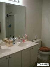 2213 Gooseberry Road Charlotte, NC 28208 - Photo 7 of 8 a bathroom with a sink and a toilet