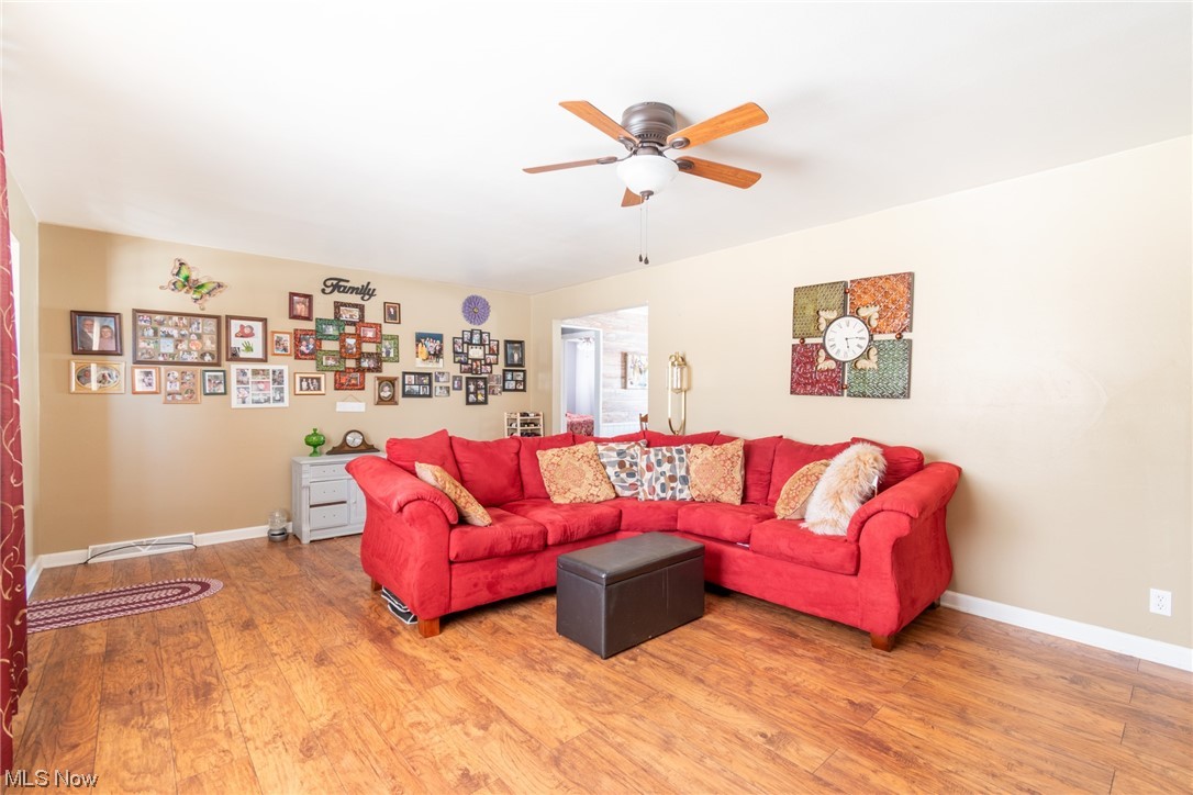 2926 Brunswick Road Youngstown, OH 44511 - Photo 6 of 33 Living room featuring hardwood / wood-style flooring and ceiling fan