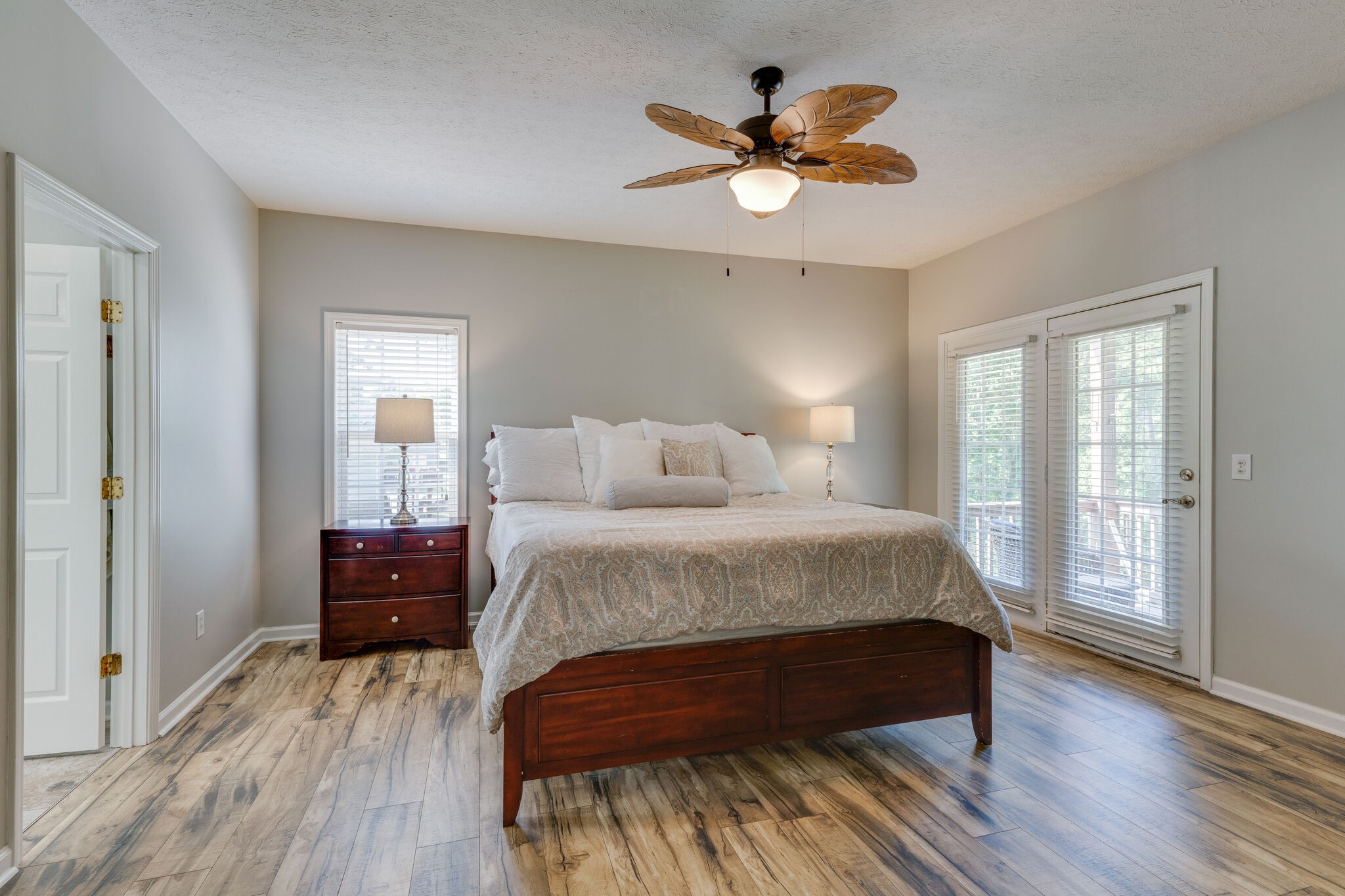 2754 Gideon Road Greenbrier, TN 37073 - Photo 16 of 45 a bedroom with a bed and a chandelier