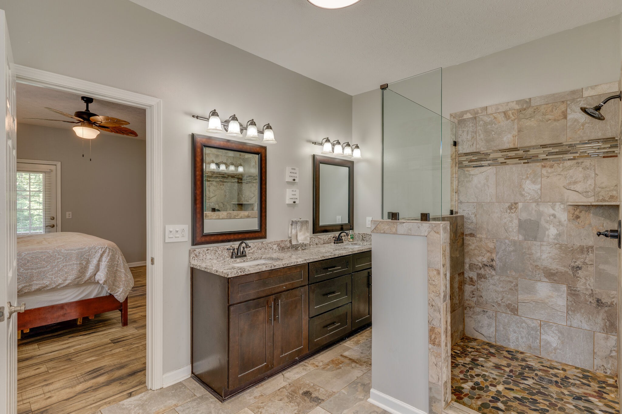 2754 Gideon Road Greenbrier, TN 37073 - Photo 20 of 45 a spacious bathroom with a granite countertop sink mirror and shower