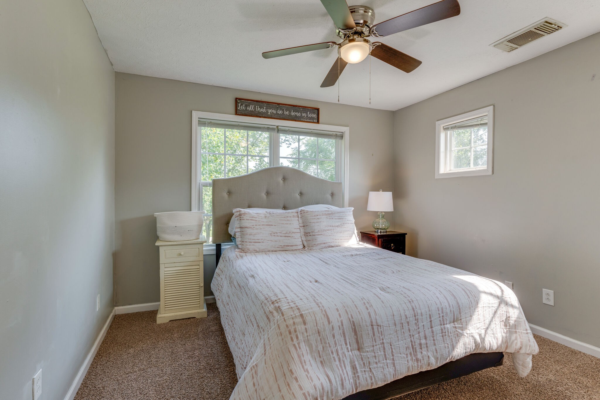 2754 Gideon Road Greenbrier, TN 37073 - Photo 25 of 45 a bedroom with a bed and a chandelier