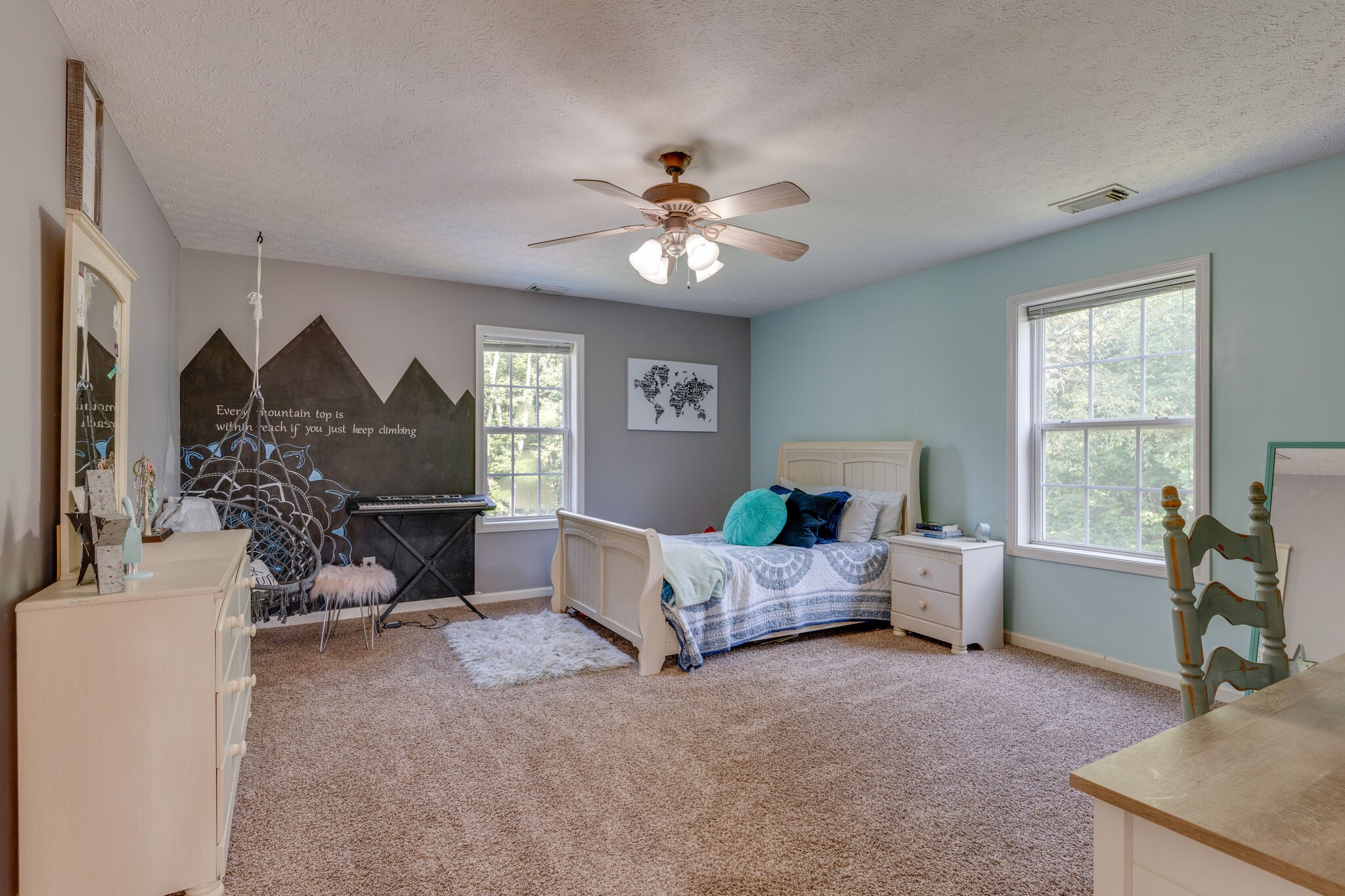 2754 Gideon Road Greenbrier, TN 37073 - Photo 27 of 45 a bed room with furniture and a chandelier