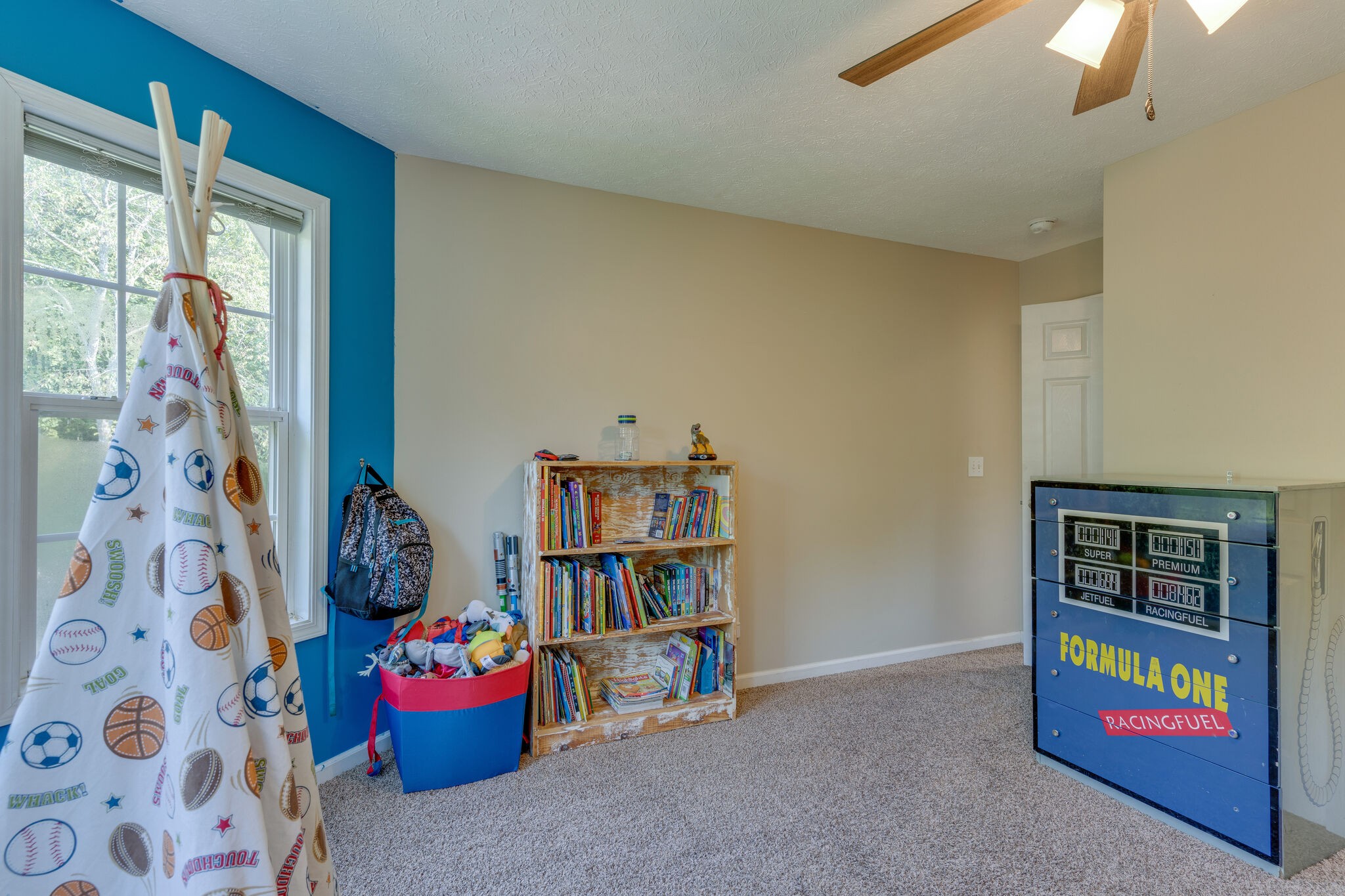 2754 Gideon Road Greenbrier, TN 37073 - Photo 31 of 45 a bedroom with furniture and a book shelf
