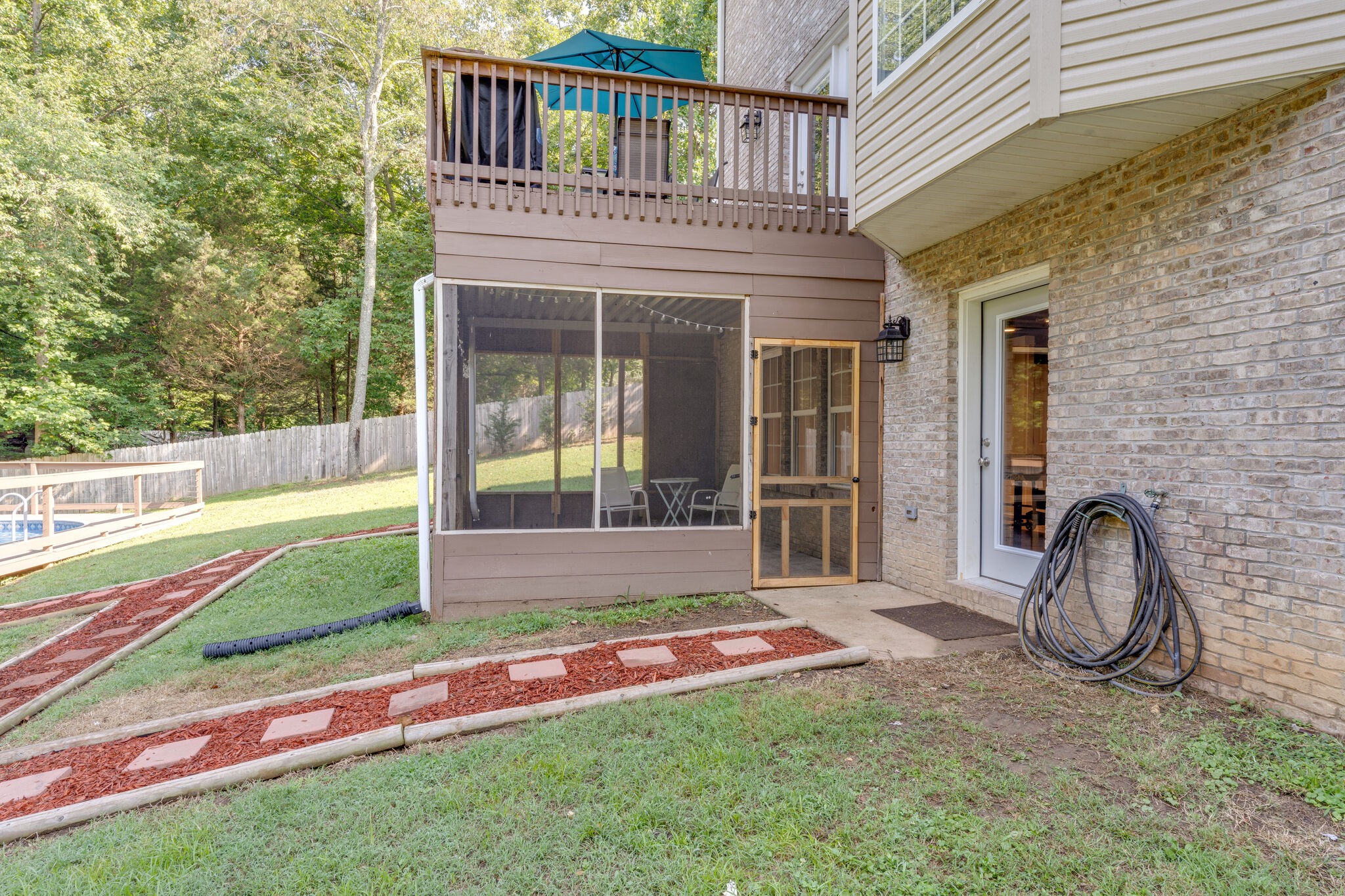 2754 Gideon Road Greenbrier, TN 37073 - Photo 42 of 45 a front view of a house with a garden