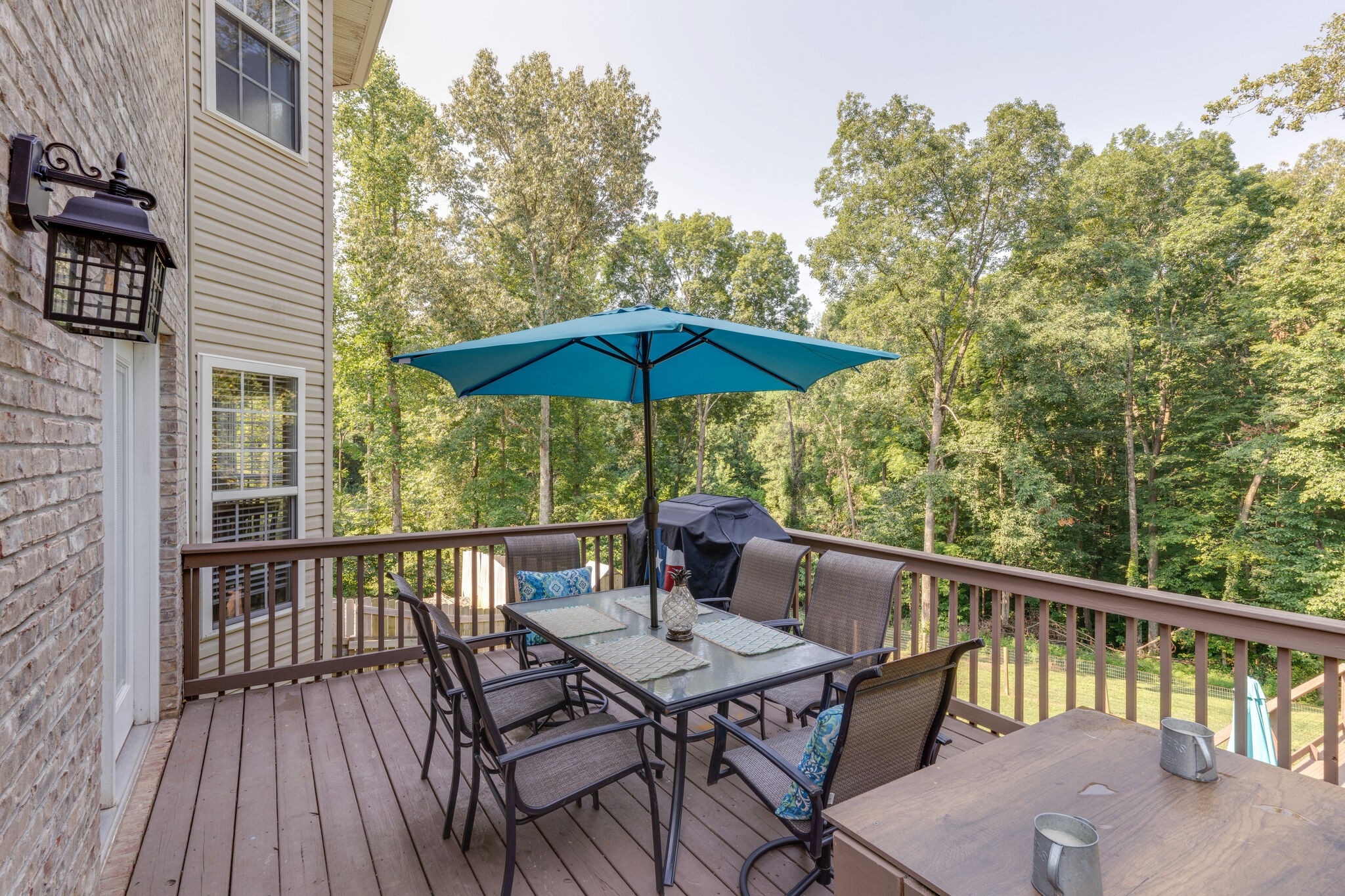 2754 Gideon Road Greenbrier, TN 37073 - Photo 43 of 45 a view of balcony with outdoor seating and wooden floor