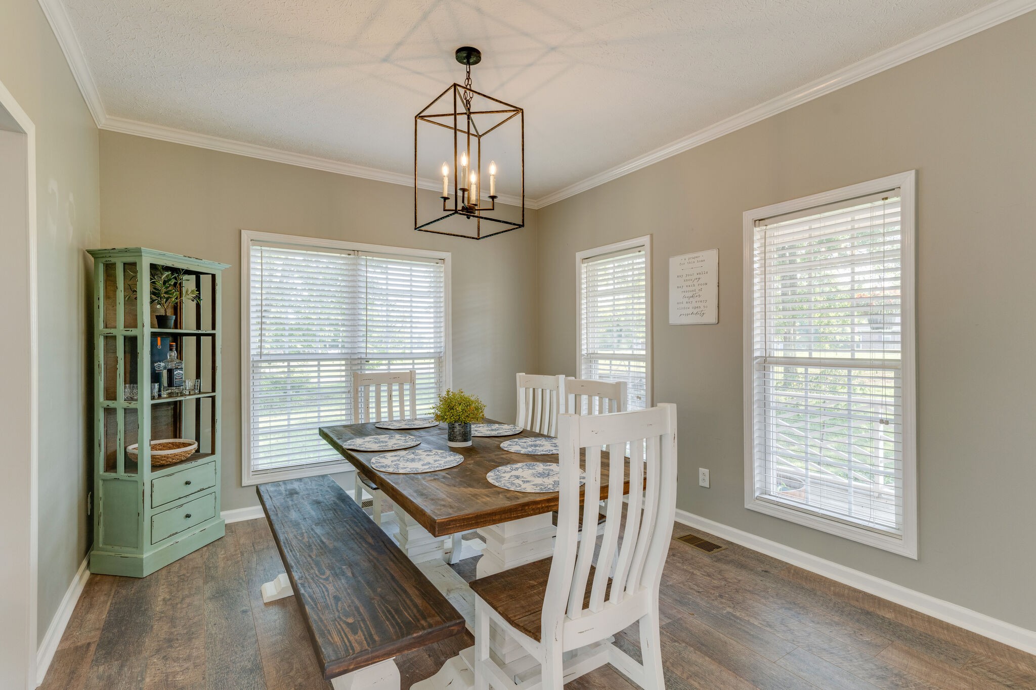 2754 Gideon Road Greenbrier, TN 37073 - Photo 6 of 45 a dining room with furniture a chandelier and wooden floor