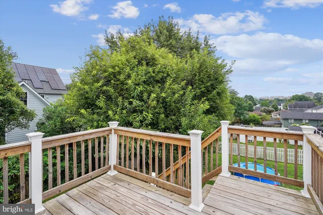 a view of a wooden roof deck