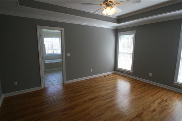 1560 Short Springs Road Tullahoma, TN 37388 - Photo 12 of 18 Large master bedroom has trey ceiling and hardwood floors.