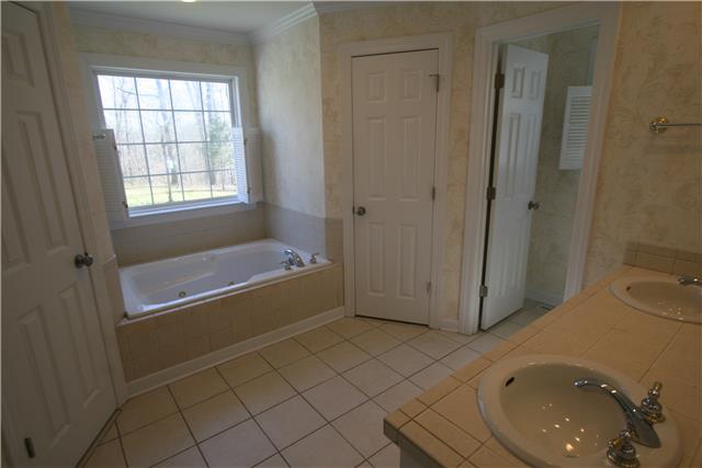 1560 Short Springs Road Tullahoma, TN 37388 - Photo 13 of 18 Master bath has double vanities a garden tub and a separate shower and 2 large closets.