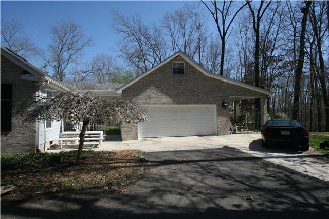 1560 Short Springs Road Tullahoma, TN 37388 - Photo 16 of 18 2 car garage has breeze way connected to home, studio apartment upstairs and a heated and cooled small room for dogs with dog run.