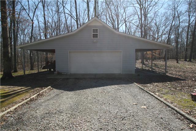 1560 Short Springs Road Tullahoma, TN 37388 - Photo 17 of 18 Separate garage/barn has a huge storage area overhead as well as covered room for equipment on either side.