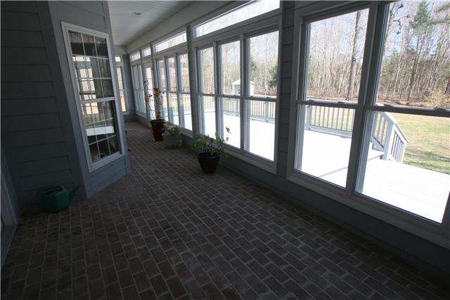 1560 Short Springs Road Tullahoma, TN 37388 - Photo 5 of 18 Sun porch is heated and cooled and has a brick floor.