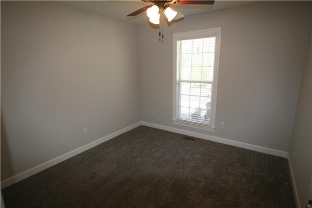 1560 Short Springs Road Tullahoma, TN 37388 - Photo 10 of 18 2 extra bedrooms on the main floor share a bath and have new carpet.