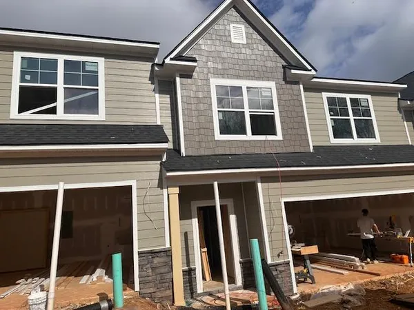 a view of a house with glass windows