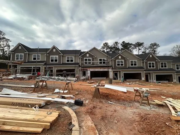 a view of a hallway with seating area