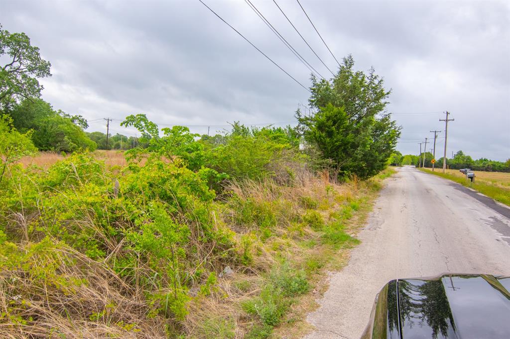 Tbd South Lockhart Road Stephenville, TX 76401 - Photo 10 of 10 a view of a yard with plants and large trees