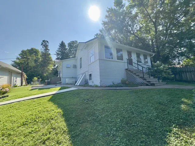 a house view with a garden space