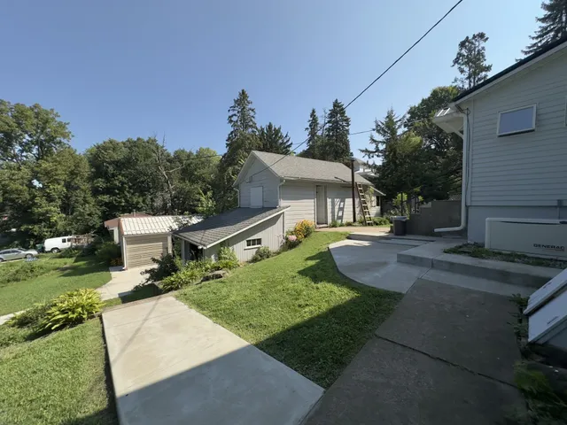 a view of a wooden deck with furniture